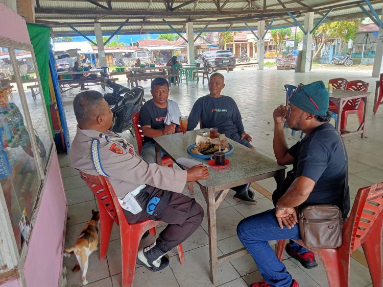 Personel Polsek KSKP Tembilahan Terus Mensosialisasikan Pemilu Damai dan Mendorong Warga untuk Menjaga Keamanan dan Ketertiban