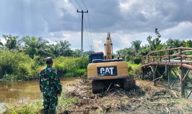 Rancang Tumpuan Gambangan, Satgas Tmmd Kodim 0313/KPR Siapkan Perlintasan Alat Berat di Jembatan T. Tahal